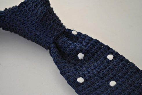 navy blue skinny knitted tie with white polka dots